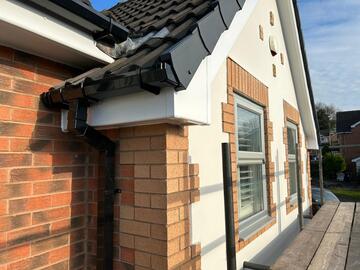 New UPVC fascia and soffit installation on red brick house in Yorkshire