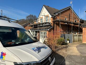 UPVC fascia and soffit installation in progress on a detached red brick home in Yorkshire