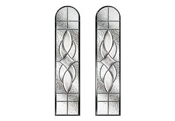 Stained glass panels with intricate patterns and geometric shapes in a vertical layout.