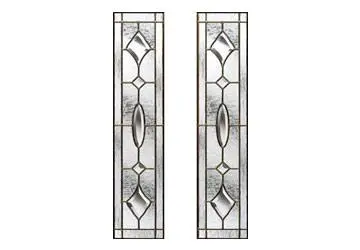 Tall stained glass panels with geometric patterns and central oval designs in a metallic frame.