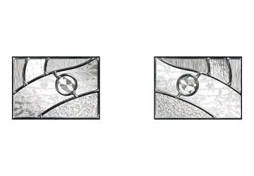 Two rectangular stained glass panels with abstract designs featuring curved lines and a circular shape in the center.