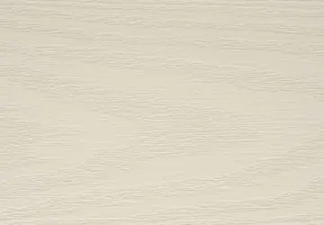 Light beige textured wooden surface with subtle grain patterns.