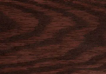 Dark wood texture with wavy grain patterns across the surface.