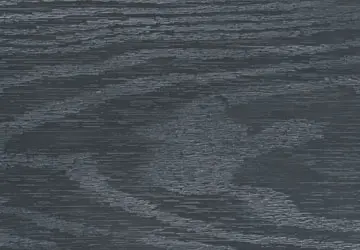 Dark wood surface with a subtle, irregular pattern.