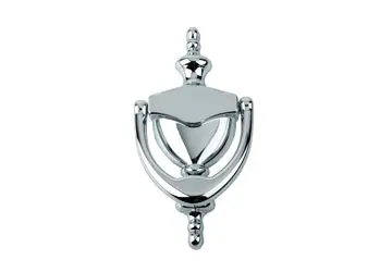 Chrome door knocker with a curved design and decorative elements, mounted on a flat surface.