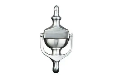 Door knocker in a polished silver finish, featuring a round base and decorative top element.